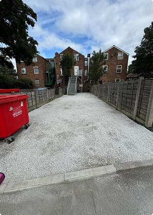 After: cleared and resurfaced gravel driveway